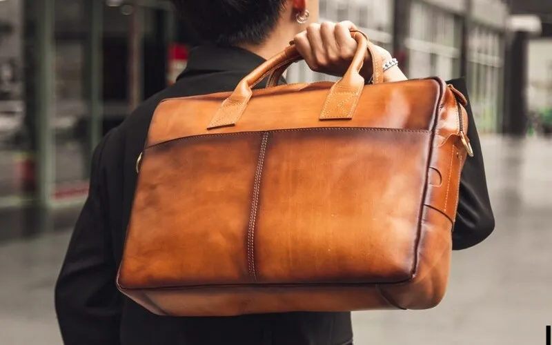 Quai xách balo laptop